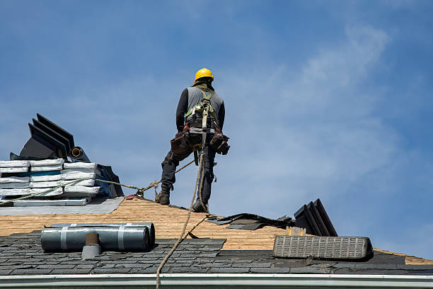 Professional Roof Replacement technician working in Alleyton, TX